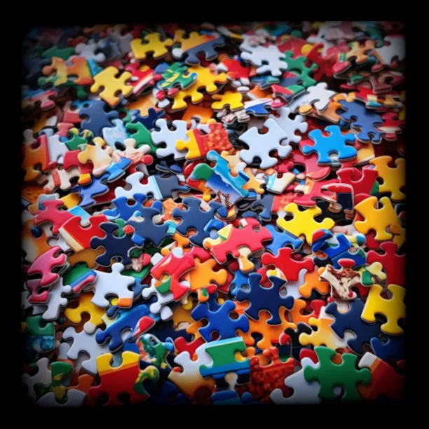 large pile of jigsaw puzzle pieces
